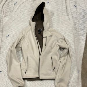 The North Face cream hooded winter coat. Size Small